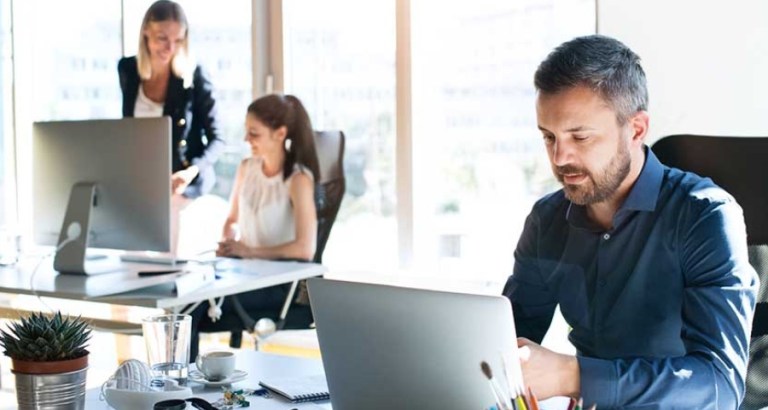 managed it services - man working at laptop in office